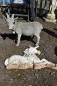 A COMPOSITE GARDEN FIGURE OF A GOAT, along with a painted wall figure of a unicorn, condition