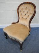 A VICTORIAN MAHOGANY FRAMED SPOON BACK CHAIR, with buttoned backrest, raised on turned and tapered