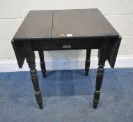 A STAINED PINE DROP LEAF TABLE, with a single frieze drawer, raised on turned legs, open width 104cm