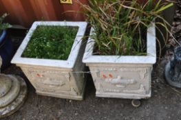 A PAIR OF SQUARE CONCRETE GARDEN PLANTERS, with detailed facets, both height 42cm