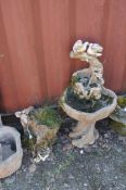 TWO MODERN CONCRETE GARDEN ORNAMENTS, one in the form of a tree stump cascade with Doves atop,