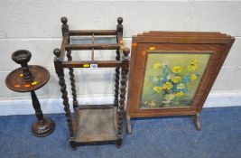 A 20TH CENTURY OAK UMBRELLA / STICK STAND, with barley twist supports, 33cm squared x height 76cm, a