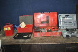 A CASED HILTI TE92 110V BREAKER, a Hilti case with drill bits, a 110v transformer, and a 240v