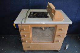 A BESPOKE ROUTER TABLE FITTED WITH A AN AXMINSTER 1/2in ROUTER, an Axminster Routalift, vented front