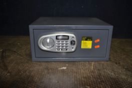 A HOME DIGITAL PERSONAL SAFE, width 43cm, depth 35cm, height 20cm, with one key and code inside (key