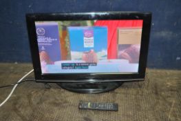A TOSHIBA 22DV713B 22in TV/DVD COMBI, with universal remote (all function of remote not working) (
