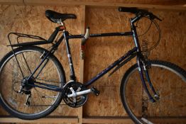 A RALEIGH PURPLE GENTS BIKE, with a 21 frame