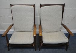 A PAIR OF MID-CENTURY TEAK ARMCHAIRS, with a high back, open armrests, low seat, raised on tapered