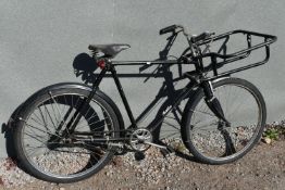 A PASHLEY BAKERS DELIVERY BIKE, in black, 23 frame, with a three speed stuntmen gears, front basket,