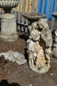 A WEATHERED COMPOSITE GARDEN FIGURE OF ROMEO AND JULIET, height 74cm, and another figure of a girl