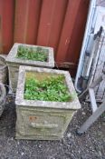 A PAIR OF SQUARE CONCRETE PLANTERS, with detailing to each facet (2)