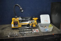 A CLARKE CL300M MINI METALWORKING LATHE, with 300mm bed, additional light, live centre, chuck