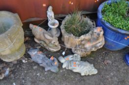 A COLLECTION OF FIVE CONCRETE GARDEN ORNAMENTS, including a planter with a beaver seated on a tree