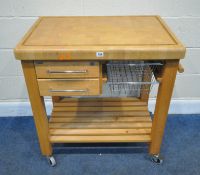 T & G WOODWARE, BRISTOL, ENGLAND, A BEECH KITCHEN TROLLEY, with a rail to one end, one side with two