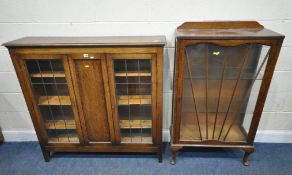 A 20TH CENTURY OAK BOOKCASE, with double lead glazed doors, width 123cm x depth 30cm x height 120cm,