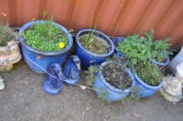 A COLLECTION OF BLUE GLAZED GARDEN POTS AND ORNAMENTS, including six plant pots, the largest being