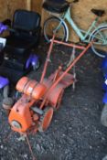 A VINTAGE HOWARD BULLDOG ROTAVATOR, condition report: finish rusted and flaking, starter cord