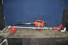 A HOMELITE HB-180 PETROL LEAF BLOWER, and a Einhell GC-BC 25AS petrol strimmer (trigger stuck) (both