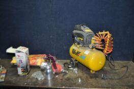A WOLF AIR OL185 AIR COMPRESSOR (PAT pass and working) along with a boxed Kestrel spray gum, and
