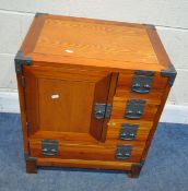 A MODERN HARDWOOD CHEST, with four assorted drawers, and a single door, width 56cm x depth 43cm x