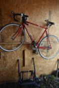A CARRERA VIRTUOSO MEN ROAD BIKE, with a 23 frame and Shimano RSX gears, along with a rear car