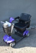 A CARECO, I-GO VERTEX SPORT MOBILITY SCOOTER, in purple, with a charger, two keys, manual and two