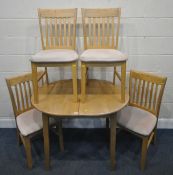 A MODERN BEECH OVAL EXTENDING DINING TABLE, with one additional fold out leaf, length 106cm x