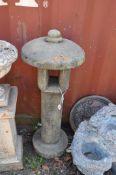 A MODERN CONCRETE ORIENTAL STYLE GARDEN ORNAMENT, with a domed cap, total height 100cm