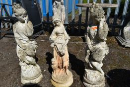 A MATCHING PAIR OF WEATHERED COMPOSITE GARDEN FIGURES, of women in flowing robes, height 69cm, and