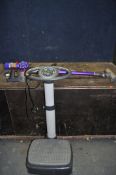 A DYSON V7 ANIMAL EXTRA CORDLESS VACUUM CLEANER, with power supply and a Lanaform vibration plate (