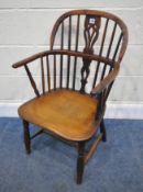 A 19TH CENTURY ELM AND YEW WOOD STICK BACK ARMCHAIR, with a central splat back, hooped back and