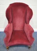 HOWARD & SONS LIMITED, BERNERS STREET, A 19TH CENTURY BURGUNDY FABRIC UPHOLSTERED HIGH BACKED '