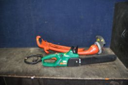 A FLYMO CONTOUR XT STRIMMER, and a Black and Decker electric chain saw (both PAT pass and