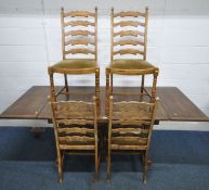 AN EARLY 20TH CENTURY OAK DRAW LEAF DINING TABLE, raised on trestle legs, united by stretchers,