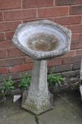 AN ART NOUVEAU STYLE BIRD BATH, height 62cm, condition Report: a minor loss to one corner
