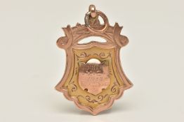 A 9CT ROSE GOLD FOB MEDAL, engraved to both sides 'ST. Johns F.C', 'Winners M.C 1922', hallmarked