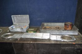 A FORD CORTINA FRONT GRILLE, with a flaking badge, a toolbox containing spanners, sockets etc, a