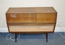 A LOEWE OPTA DOMINO 6826 RADIOGRAM, with a gloss walnut cabinet and maple interior, a PE66 turntable
