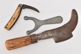 THREE ITEMS, to include a flat cap pruning knife, fitted with an antler handle, brass cap, blade