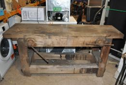 A WOODEN WORKBENCH WITH LONG TWO ANCHOR POINT VICE, width 180cm, depth 66cm, height 84cm,