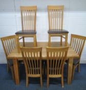 A MODERN SOLID OAK DINING TABLE, raised on square tapered legs, length 150cm x depth 90cm x height