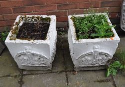A PAIR OF CONCRETE GARDEN PLANTERS, with crown detailing to each facet, heights 39cm