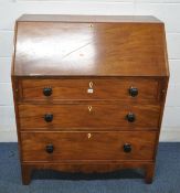 A GEORGIAN MAHOGANY BUREAU, the fall front door enclosing a fitted interior, over three drawers,