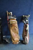 TWO VINTAGE GOLF BAGS, containing Wilson, Dunlop, Pal Joey, etc clubs, and a trolley