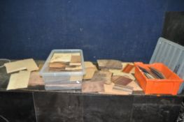 TWO PLASTIC BOXES CONTAINING EXOTIC WOOD VENEERS, including walnut, burr walnut, birds eye maple,