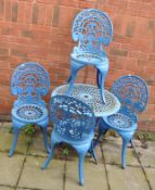 A MODERN ALUMINIUM CIRCULAR GARDEN TABLE AND FOUR SIMILAR CHAIRS, with pierced fretwork detail to