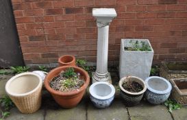 A COLLECTION OF GARDEN ITEMS, including a columned stand (slight damage at top) six planters, etc (