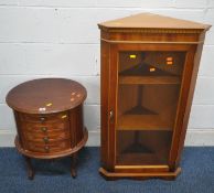 A SMALL OVAL CHEST OF FOUR DRAWERS, raised on cabriole legs, width 48cm x depth 40cm x height