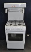 A NEW WORLD GAS COOKER, with eye level grill, oven and four rings, width 55cm, depth 60cm, height
