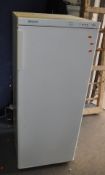 A FRIGIDAIRE LARDER FREEZER, width 55cm, depth 60cm, height 134cm (PAT pass and working at -18